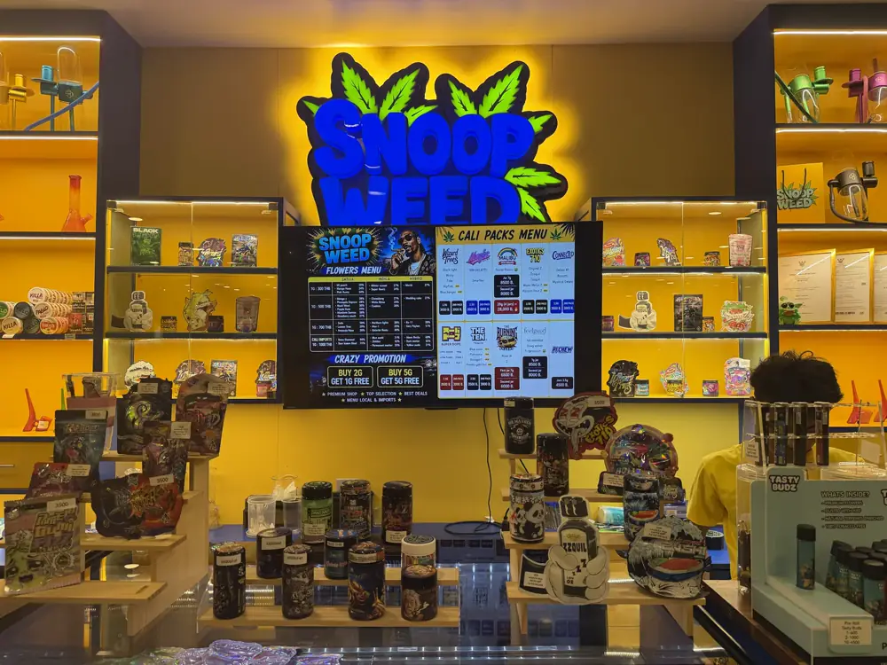 Snoop Weed lounge interior with bean bags and screens